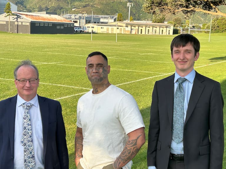 Syd Te Rata with lawyers Chris Nicholls and Jack Cammock-Nicholls at McEwan Park, Petone